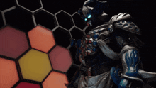 a statue of a man with horns is standing in front of a honeycomb background