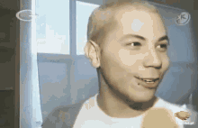 a close up of a man 's face with a watermark that says rbd.gif
