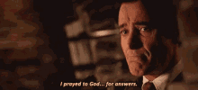 a man in a suit and tie is saying i prayed to god ... for answers .