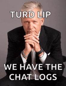 a man in a suit and tie is sitting with his hands folded and says turd lip we have the chat logs below him