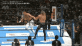 a wrestling match between cody and omega is being shown on tv