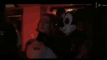 a mickey mouse mask is being worn by a person in a video game