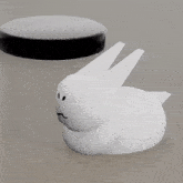 a 3d model of a white rabbit with a black face
