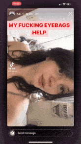 a screenshot of a woman 's face with the caption " my fucking eyebags help "