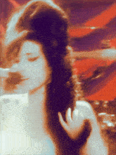 a blurry picture of a woman 's face and hair