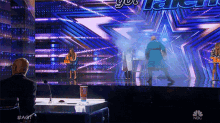 Blowing The Cups Americas Got Talent GIF - Blowing The Cups Americas Got Talent Agt GIFs