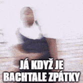 a blurred image of a nun with the words ja kdyz je bachtale zpatky written on it