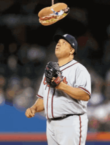 Mets Pitcher Bartolo Colon Swings Hard, Misses Pitch, Loses Helmet (GIF) 