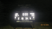 a scoreboard at bad boy mowers stadium shows the score
