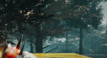 a blurred image of a robot with a red head