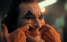 Sadness Joker GIF - Sadness Joker Smile GIFs