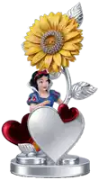 a figurine of snow white holding a heart and a flower