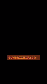 a person 's hands are surrounded by confetti and the name günbatim fatih is on the bottom right