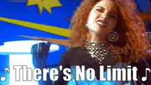 a woman with red hair is singing there 's no limit '