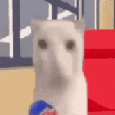 a white cat is holding a can of pepsi in front of a red box