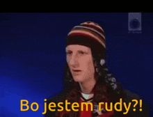 a group of people sitting at a table with the words bo jestem rudy in front of them