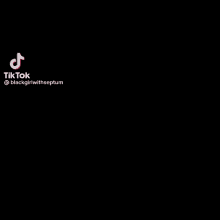 a woman in a pink t-shirt is dancing in front of a door .
