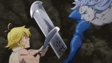 a man is holding a sword while another man holds a shield .