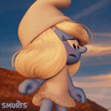 a smurf wearing a hat and a white dress