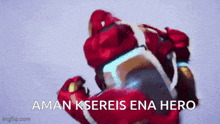 a picture of a man in a red suit with the words aman kseres ena hero below him