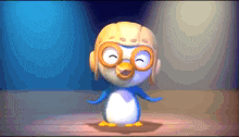a cartoon penguin wearing a helmet and glasses is standing on a stage