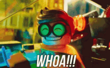 a lego man with green goggles and the words whoa !!! on his face