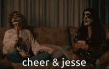 two women sitting on a couch with their faces painted and the words cheer and jesse written on the bottom