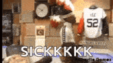 a man is standing in front of a clock and a jersey that says 52 on it .