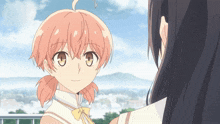 two anime girls are looking at each other and one has pink hair