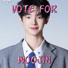 a man in a suit and tie with the words vote for woojin written on his face