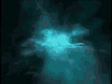 a computer generated image of a blue glowing object