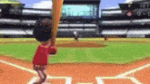 a video game character is swinging a bat at a baseball on a field .