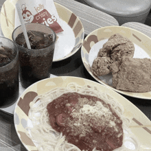a packet of jolly crispy fries sits next to a plate of spaghetti