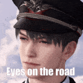 a close up of a man 's face with the words eyes on the road below him