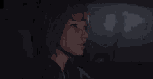 a woman is sitting in the back seat of a car and looking out the window .