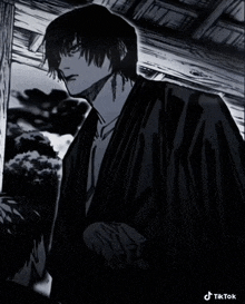 a black and white drawing of a man in a kimono with tik tok written on the bottom