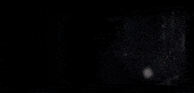a dark background with a lot of glowing lights