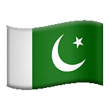 a green and white flag with a crescent moon and star on it is waving in the wind .