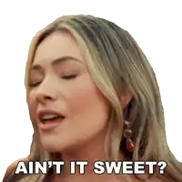 a close up of a woman 's face with the words ain 't it sweet behind her