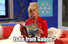 a woman is sitting on a couch reading a magazine with the caption is he from gabon