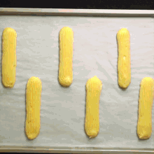 a bunch of french fries are on a tray with the word mr. always on the bottom