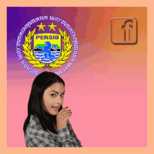 a woman is standing in front of a logo for persib