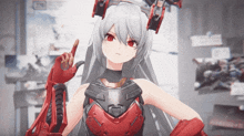 a girl with gray hair and red eyes is wearing a red glove