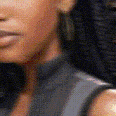 a close up of a woman 's face with a grid pattern on it .