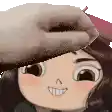 a person is petting a cartoon character 's head with their hand .