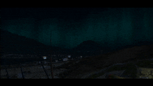 a dark scene with a few trees and a sign that says ' i 'm sorry '