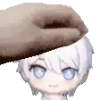 a hand is petting a little girl 's head with a towel .