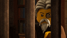 a lego figure with a beard and mustache is behind bars