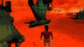 a man in a red shirt is standing in front of a large monster