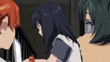 a girl with long black hair is looking at a boy with red hair